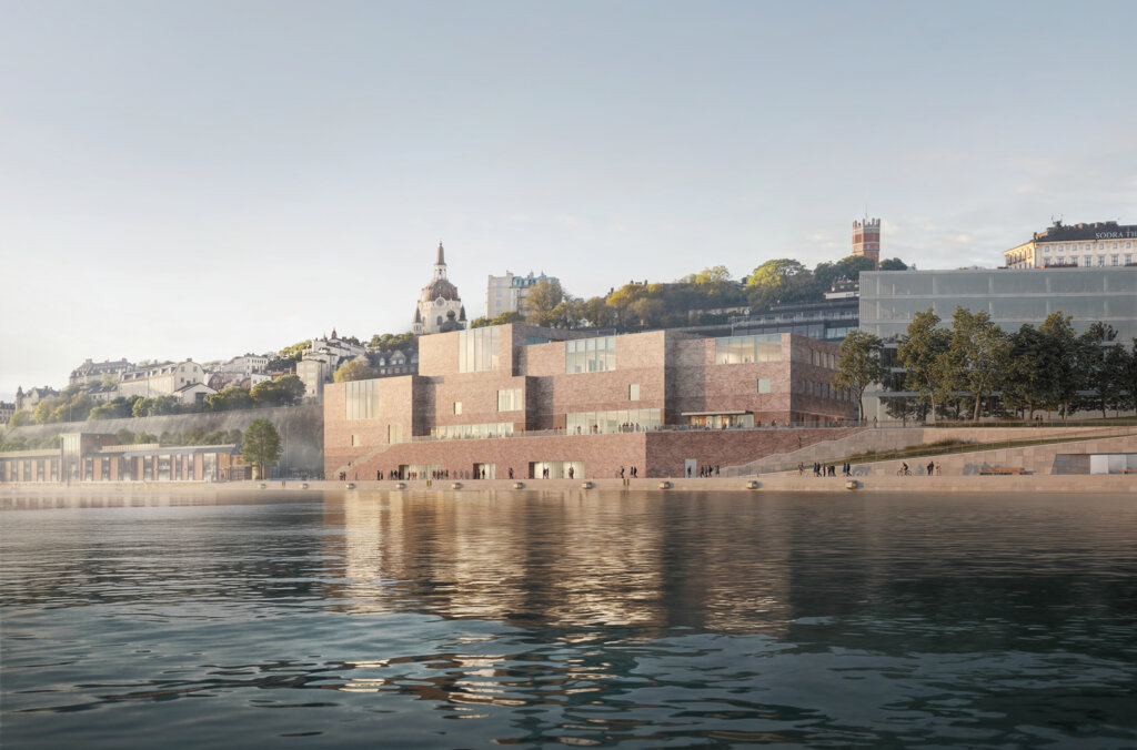 Vy från vattnet längs med kajen.