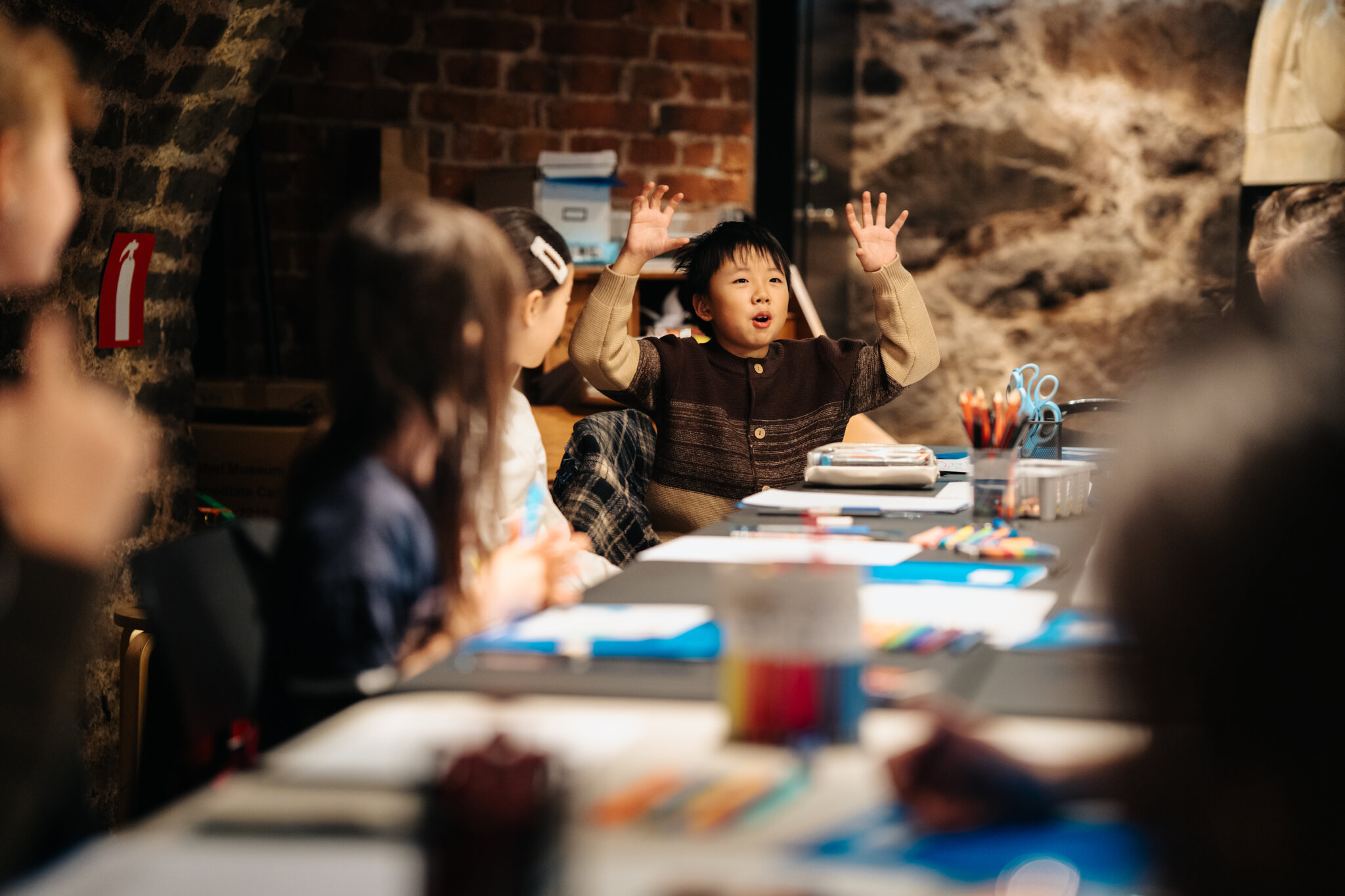 Children doing crafts at the museum.